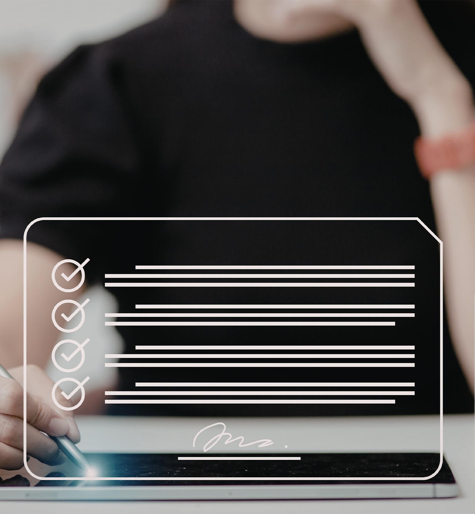 Person writing on a tablet