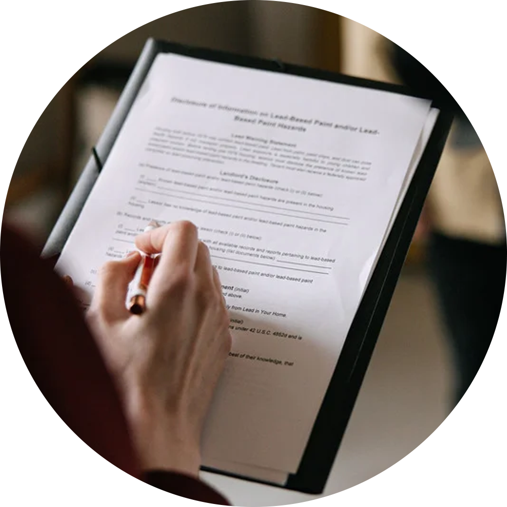 A person filling up a form