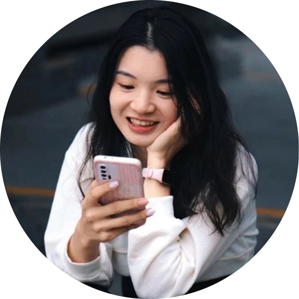 A-person-happily-looking-at-a-smartphone